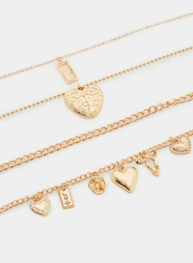 Styli  Pack of 4 - Gold Layered Charm Necklace for Women | Best Price UAE